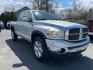 2007 silver Dodge Ram 1500 Laramie Quad Cab 4WD (1D7HU18267S) with an 5.7L V8 OHV 16V engine, 5-Speed Automatic Overdrive transmission, located at 101 N. Main Street, Muncy, PA, 17756, (570) 546-5462, 41.207691, -76.785942 - Photo#1